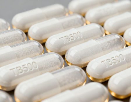 TB500 capsules in a clean, photographic arrangement.